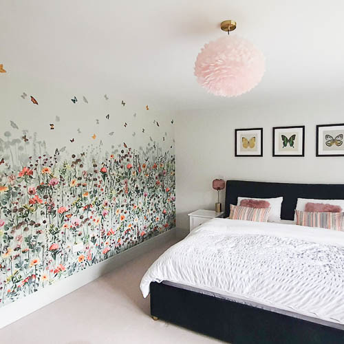 Calming bedroom with a floral mural and soft pastel styling by interior designer Hertfordshire, Farr Better Interiors